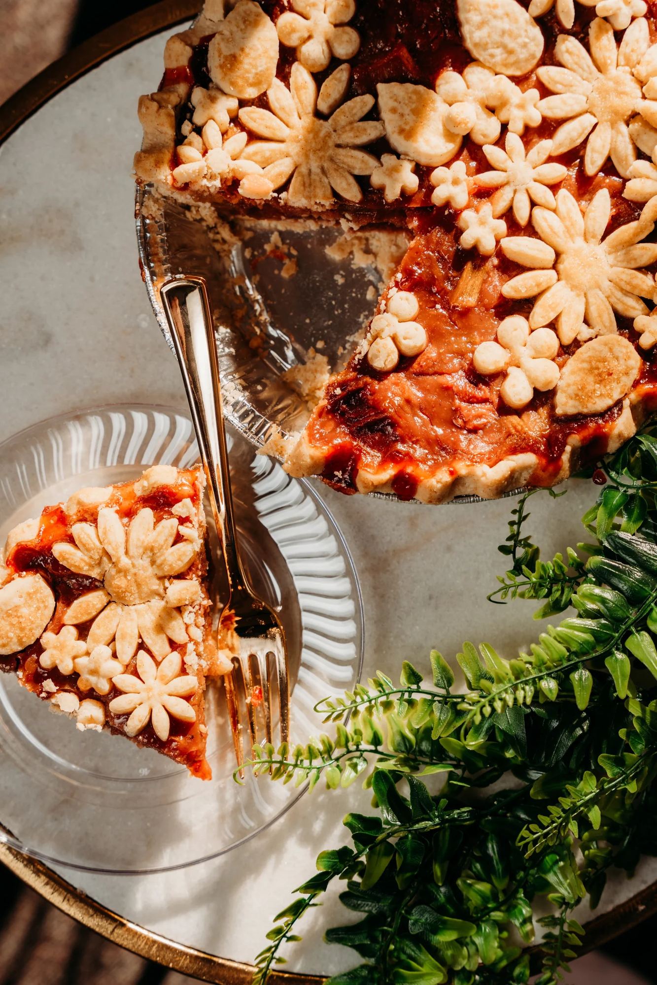 Fruit pie with pastry flowers