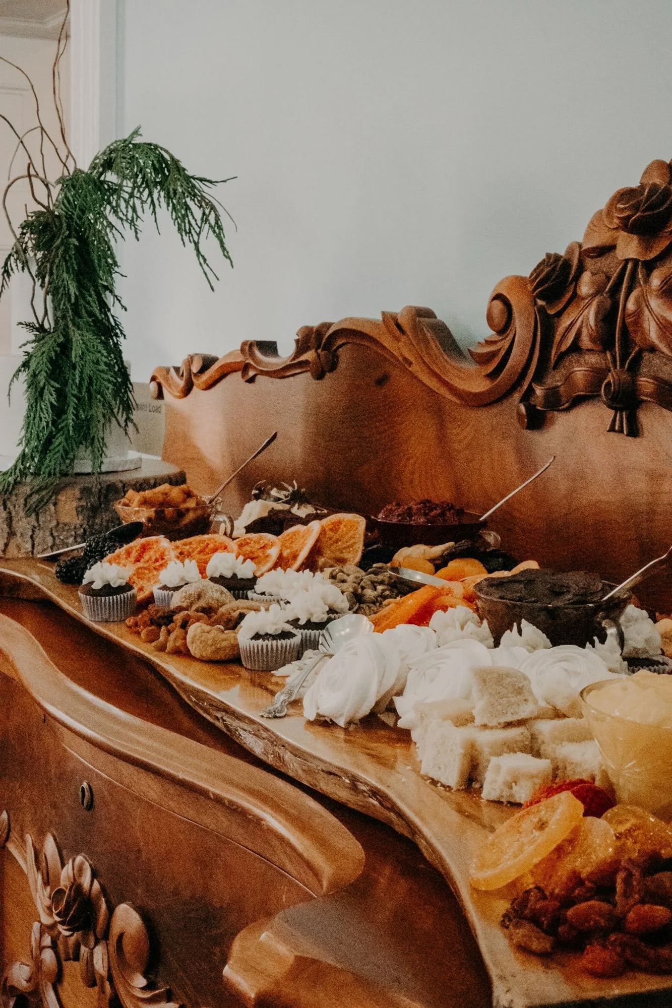 Grazing table with cupcakes and bread